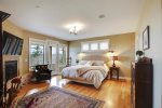 downstairs master bedroom with king bed at Seascape Retreat